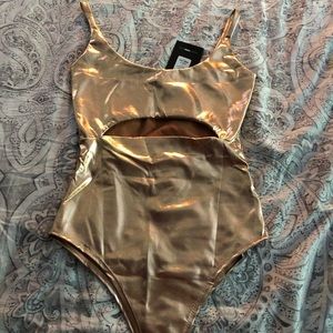 NWT Cut to the Chase gold bodysuit Sz S